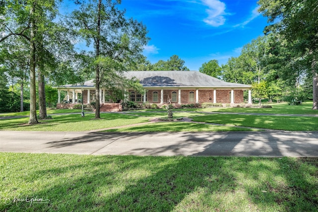 3669 Fountainbleau Rd, Keithville, LA 71047 - ranch-style home featuring a front lawn and brick siding
