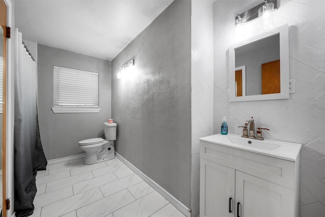 631 N Robinson Dr, Robinson, TX 76706 - full bathroom with vanity and marble look tiles