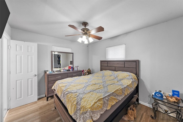 631 N Robinson Dr, Robinson, TX 76706 - bedroom featuring light wood-style flooring and a ceiling fan