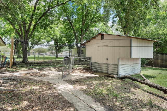 631 N Robinson Dr, Robinson, TX 76706 - view of outbuilding with a gate