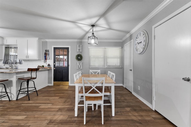 631 N Robinson Dr, Robinson, TX 76706 - dining room featuring dark wood-style floors and crown molding