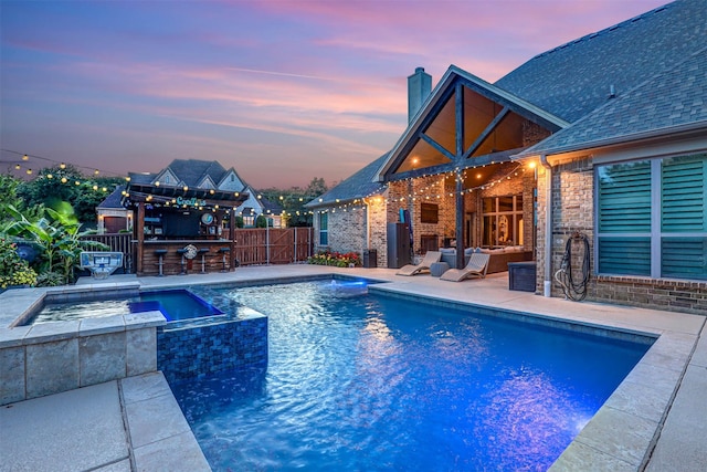 2000 Diamond Rim Pass Rd, Keller, TX 76248 - pool at dusk with a patio area and a pool with connected hot tub