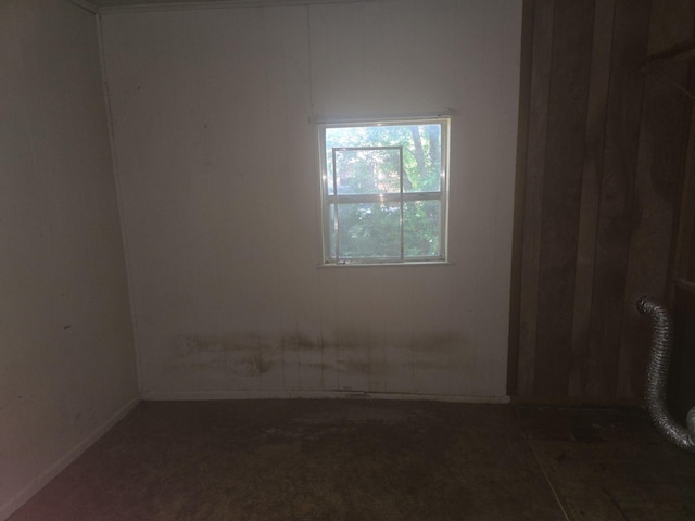 311 Elmo St, Cleburne, TX 76031 - spare room featuring carpet flooring and baseboards