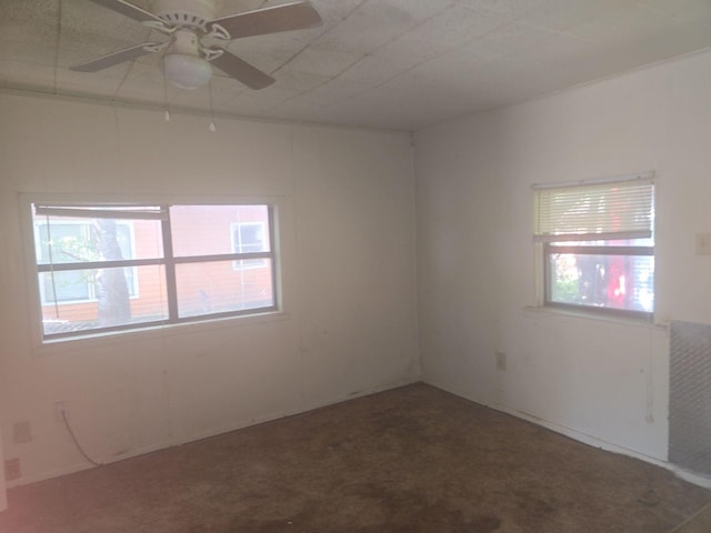 311 Elmo St, Cleburne, TX 76031 - empty room with plenty of natural light, carpet floors, and ceiling fan