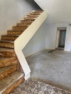 733 Intrepid Dr, Garland, TX 75043 - stairway with lofted ceiling