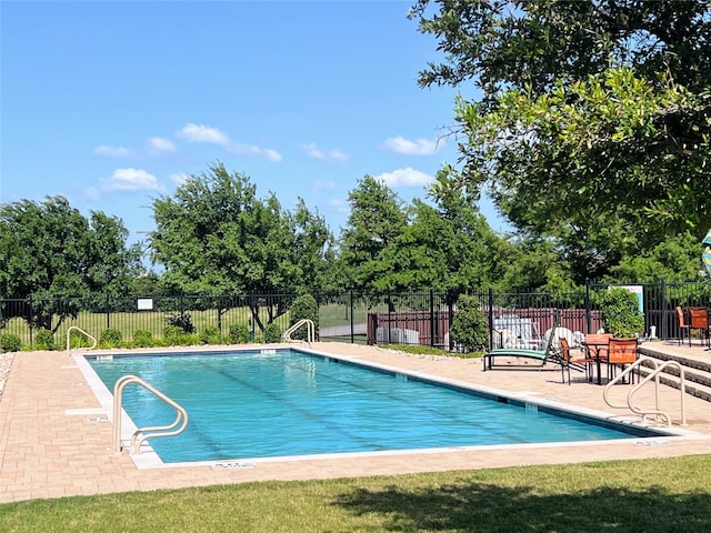 255 Carolina Trce, Fate, TX 75189 - community pool with a patio area and view of scattered trees