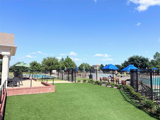 255 Carolina Trce, Fate, TX 75189 - view of yard featuring a community pool and a patio