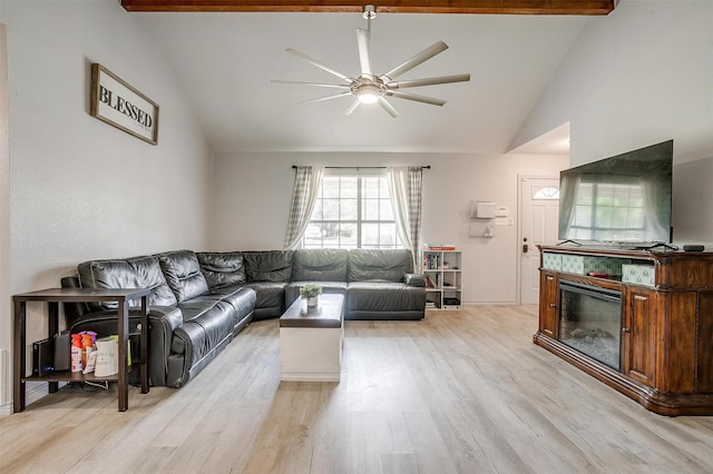 397 Flat Rock Rd, Azle, TX 76020 - living area featuring vaulted ceiling, a ceiling fan, and light wood-style floors