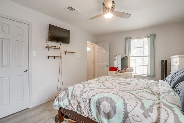 397 Flat Rock Rd, Azle, TX 76020 - bedroom with light wood finished floors and ceiling fan