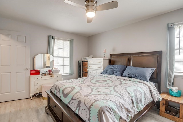 397 Flat Rock Rd, Azle, TX 76020 - bedroom with light wood-style floors, multiple windows, and ceiling fan