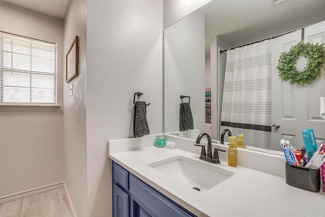 397 Flat Rock Rd, Azle, TX 76020 - bathroom with vanity, wood finished floors, and a textured wall
