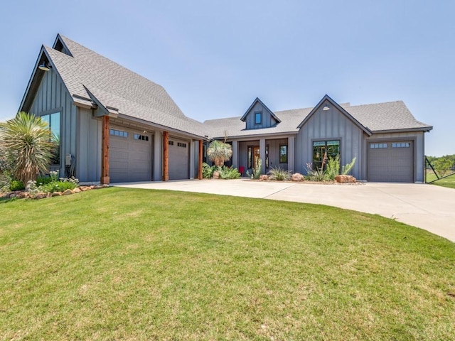 641 Cox Rd, Waxahachie, TX 75167 - modern farmhouse style home featuring board and batten siding, driveway, a front lawn, and a garage