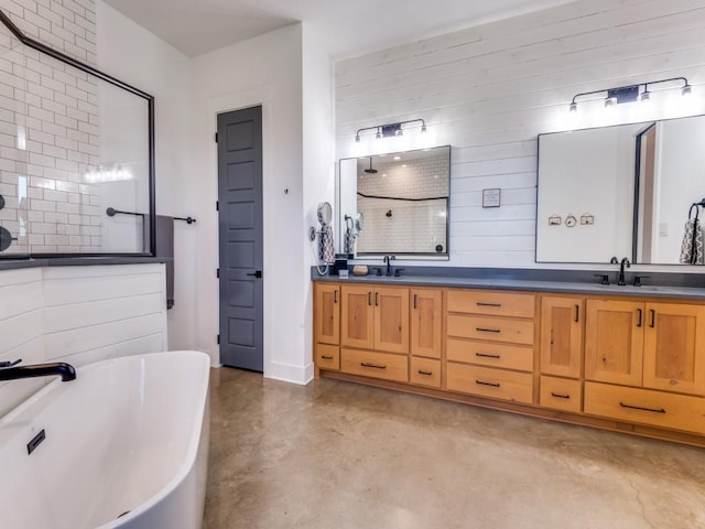 641 Cox Rd, Waxahachie, TX 75167 - bathroom featuring tiled shower, concrete floors, double vanity, and a soaking tub