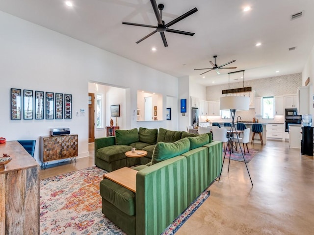 641 Cox Rd, Waxahachie, TX 75167 - living room featuring a ceiling fan, recessed lighting, and finished concrete floors