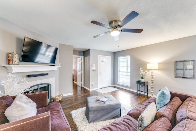 2019 Mcbroom St, Dallas, TX 75212 - living room with a ceiling fan, wood finished floors, and a fireplace