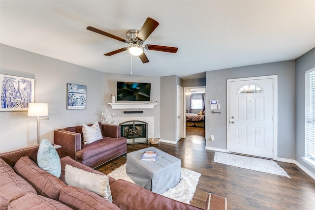2019 Mcbroom St, Dallas, TX 75212 - living room with ceiling fan, dark wood-type flooring, and a fireplace