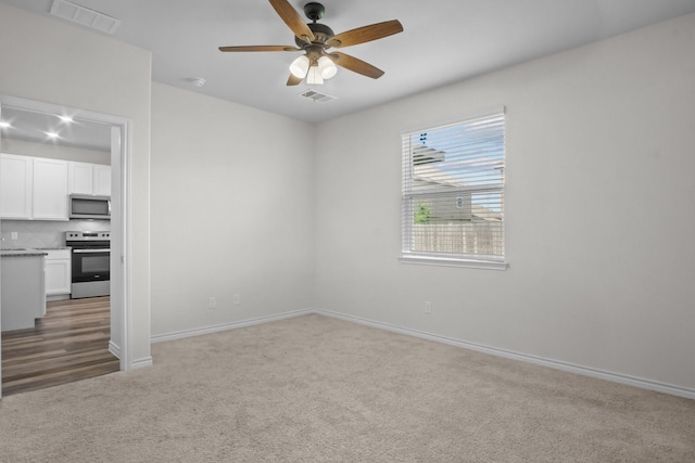 8313 White Pine Dr, Fort Worth, TX 76123 - unfurnished room with a ceiling fan and carpet floors