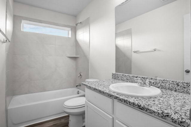 8313 White Pine Dr, Fort Worth, TX 76123 - full bath with vanity, washtub / shower combination, and wood finished floors