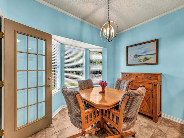 3502 Stage Coach Trl, Weatherford, TX 76087 - dining room featuring crown molding, a chandelier, a textured ceiling, and light tile patterned floors
