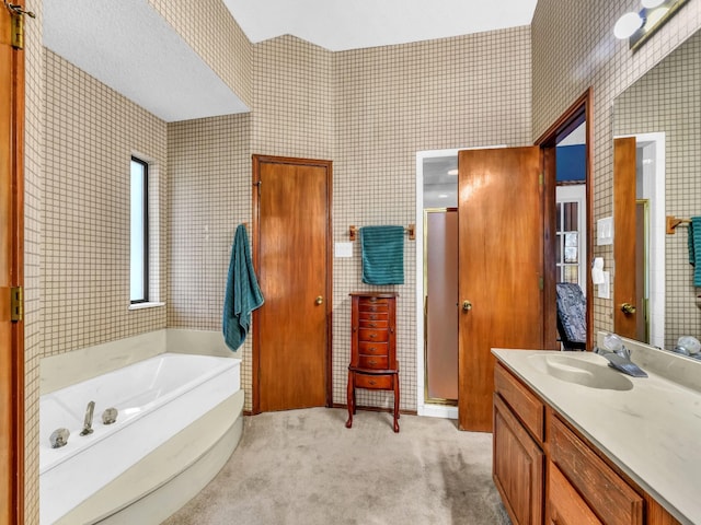 3502 Stage Coach Trl, Weatherford, TX 76087 - bathroom featuring a shower stall, vanity, and a bath