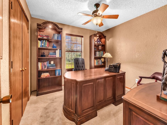 3502 Stage Coach Trl, Weatherford, TX 76087 - office area with a textured wall, light colored carpet, a textured ceiling, and a ceiling fan