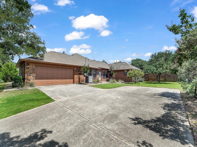 3502 Stage Coach Trl, Weatherford, TX 76087 - single story home featuring concrete driveway, an attached garage, and brick siding