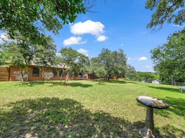 3502 Stage Coach Trl, Weatherford, TX 76087 - view of yard with a storage shed