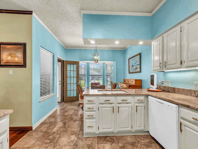 3502 Stage Coach Trl, Weatherford, TX 76087 - kitchen featuring white dishwasher, ornamental molding, a peninsula, white cabinetry, and a textured ceiling