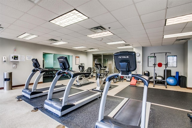 1200 Main St Unit 1402, Dallas, TX 75202 - gym with a paneled ceiling and baseboards