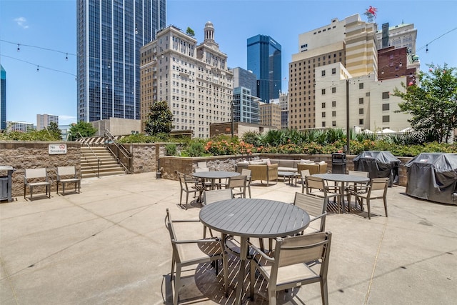 1200 Main St Unit 1402, Dallas, TX 75202 - view of patio with grilling area and a view of city