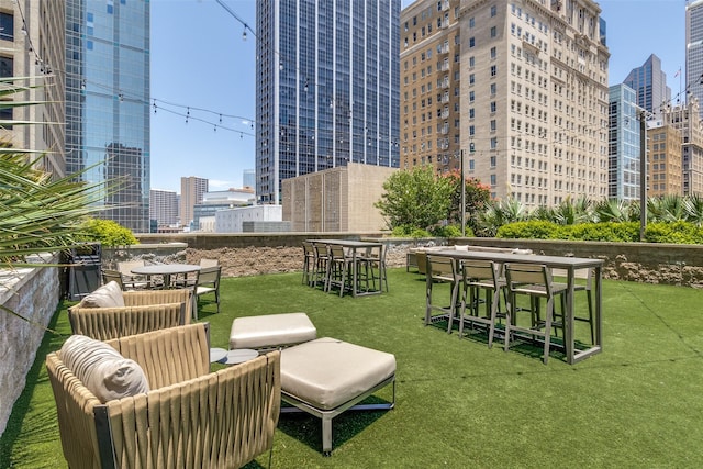 1200 Main St Unit 1402, Dallas, TX 75202 - view of home's community with a view of city and a lawn