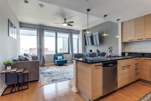 1200 Main St Unit 1402, Dallas, TX 75202 - kitchen featuring stainless steel dishwasher, open floor plan, light brown cabinets, light wood-style flooring, and ceiling fan