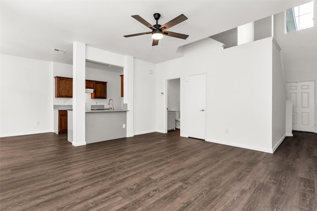 2142 Stonebrook Ln, Mesquite, TX 75181 - unfurnished living room with a ceiling fan and dark wood finished floors
