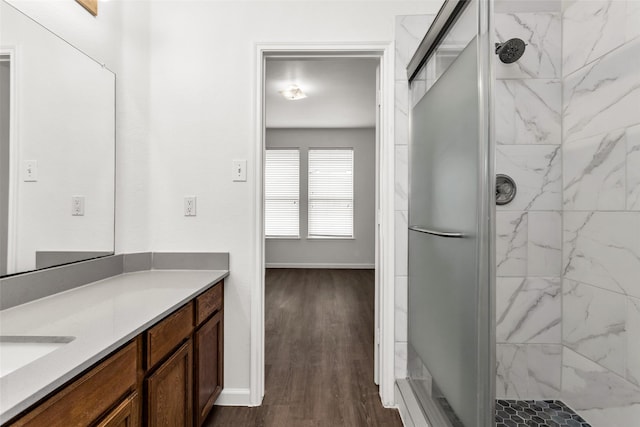 2142 Stonebrook Ln, Mesquite, TX 75181 - full bath with vanity, a stall shower, and wood finished floors