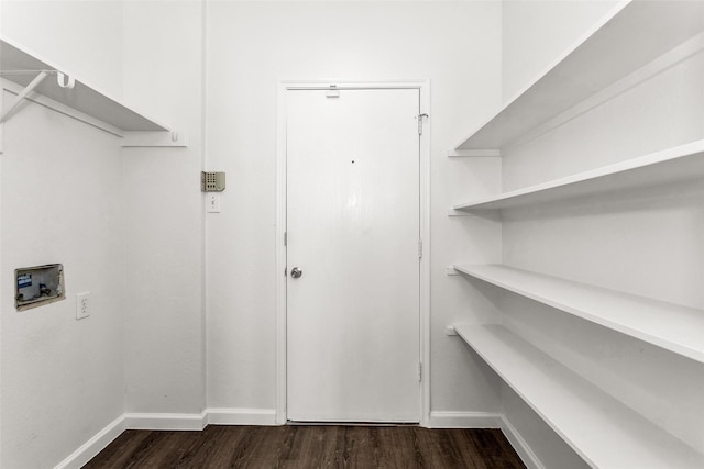 2142 Stonebrook Ln, Mesquite, TX 75181 - washroom featuring washer hookup and dark wood finished floors