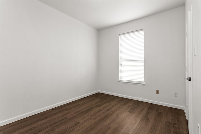 2142 Stonebrook Ln, Mesquite, TX 75181 - unfurnished room with dark wood finished floors and baseboards