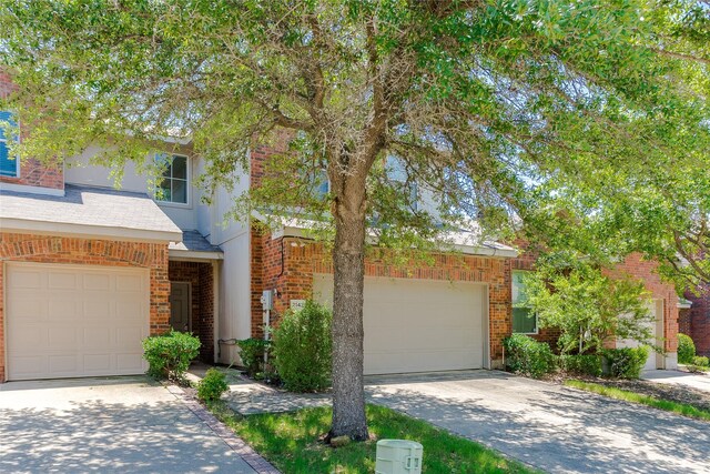 2142 Stonebrook Ln, Mesquite, TX 75181 - view of front of house with concrete driveway and brick siding