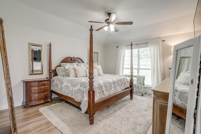 705 Tracy Dr, Azle, TX 76020 - bedroom featuring light wood-type flooring, vaulted ceiling, and ceiling fan