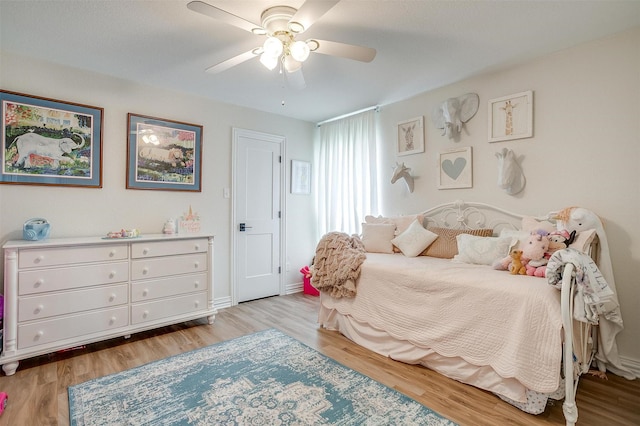 705 Tracy Dr, Azle, TX 76020 - bedroom featuring light wood-type flooring and a ceiling fan