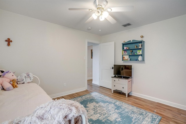 705 Tracy Dr, Azle, TX 76020 - bedroom with light wood-type flooring and ceiling fan