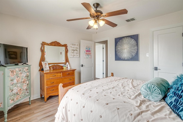 705 Tracy Dr, Azle, TX 76020 - bedroom with light wood-type flooring and ceiling fan