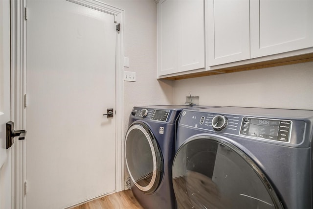 705 Tracy Dr, Azle, TX 76020 - laundry area with cabinet space, separate washer and dryer, and light wood-type flooring