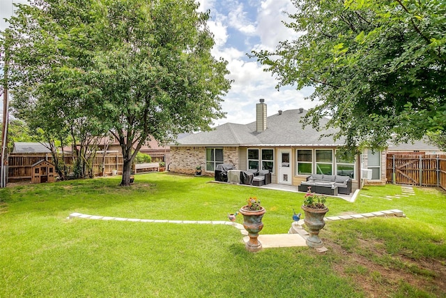 705 Tracy Dr, Azle, TX 76020 - back of property with an outdoor living space, a fenced backyard, a chimney, and a patio