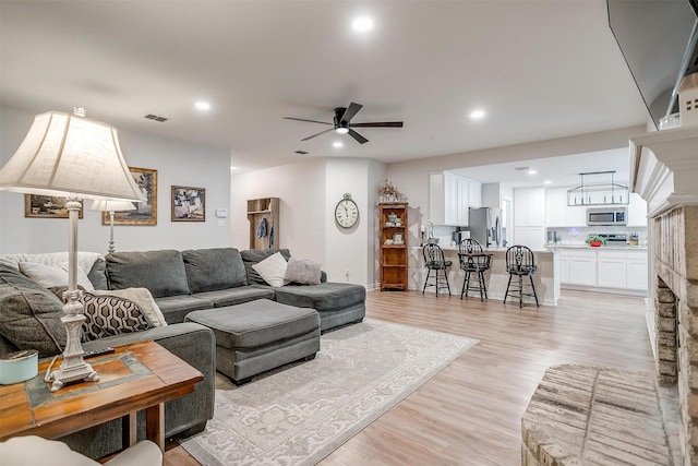 705 Tracy Dr, Azle, TX 76020 - living area with a ceiling fan, recessed lighting, and light wood-style floors
