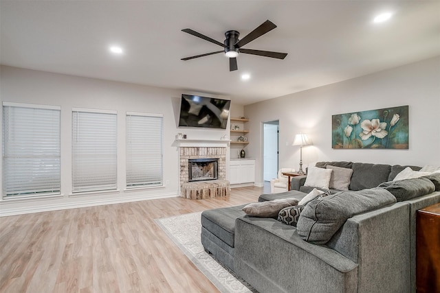 705 Tracy Dr, Azle, TX 76020 - living area featuring ceiling fan, light wood finished floors, a brick fireplace, and recessed lighting