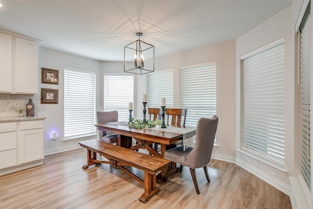 705 Tracy Dr, Azle, TX 76020 - dining space featuring a chandelier and light wood finished floors