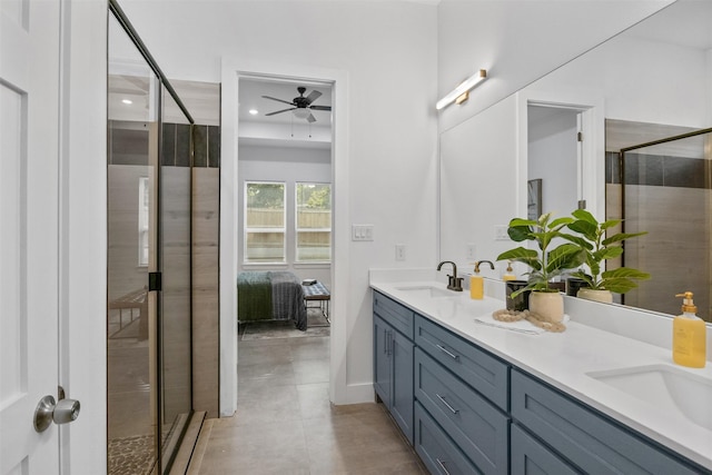 510 Woodrow Ave, Fort Worth, TX 76105 - ensuite bathroom with a ceiling fan, double vanity, a shower stall, recessed lighting, and tile patterned flooring