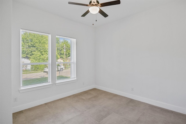 510 Woodrow Ave, Fort Worth, TX 76105 - spare room featuring baseboards and ceiling fan