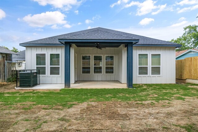 510 Woodrow Ave, Fort Worth, TX 76105 - rear view of property with board and batten siding, a ceiling fan, a patio area, and a shingled roof