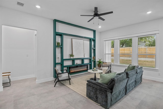 510 Woodrow Ave, Fort Worth, TX 76105 - living room featuring a ceiling fan and recessed lighting
